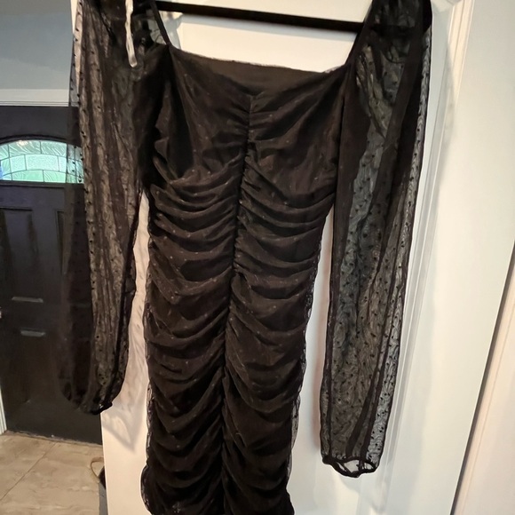 Elegant Black Dress with Sheer Sleeves - Picture 6 of 10